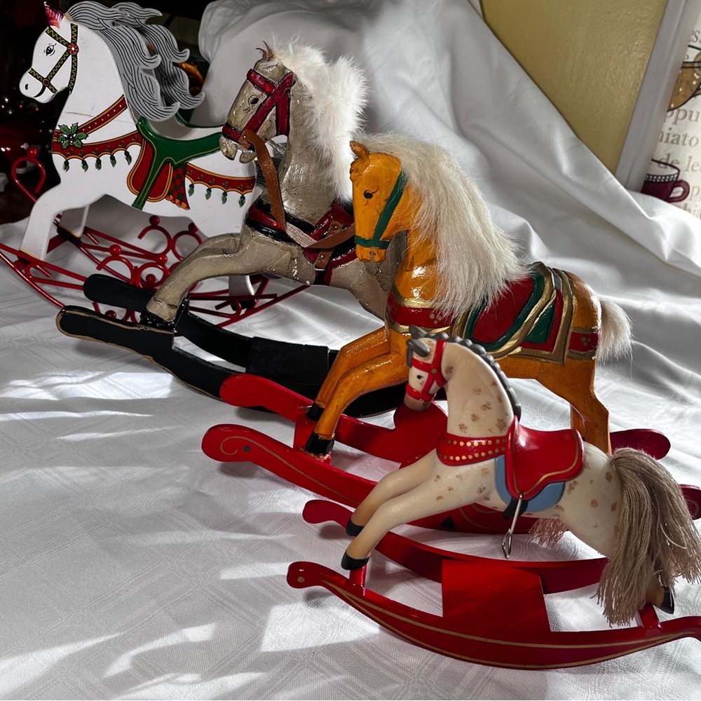Lot of four (4) decorative wooden rocking horses.